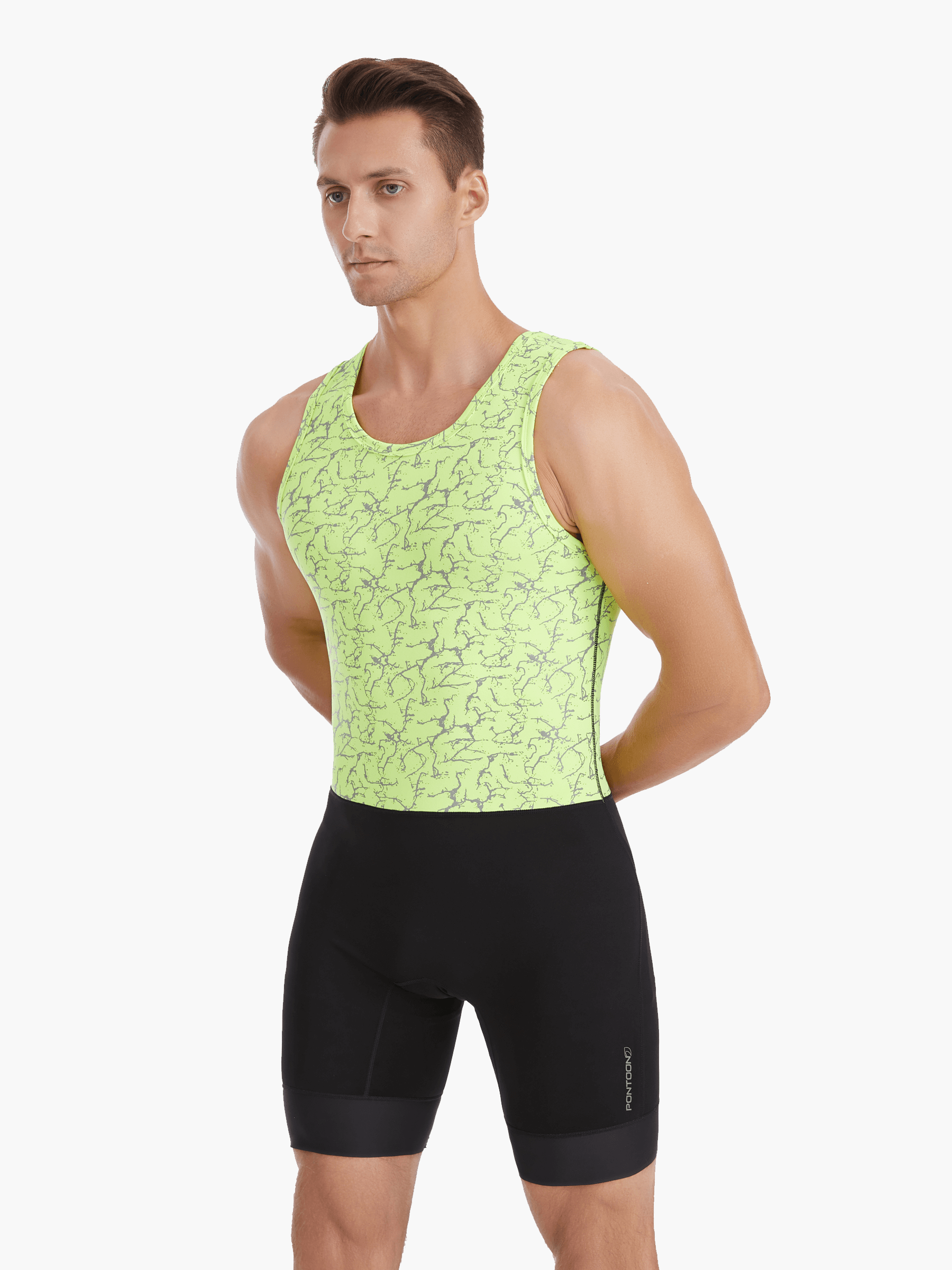 Angled front view of the HighViz Men’s Reflective AIO highlighting the silver reflective print, seamless design, and bold contrast between the green top and black bottom.