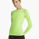 Angled front view of the SolarShield UVTee Long Sleeve for Ladies in neon yellow, highlighting its feather-light, water-resistant fabric and tailored design for maximum comfort and mobility during rowing sessions