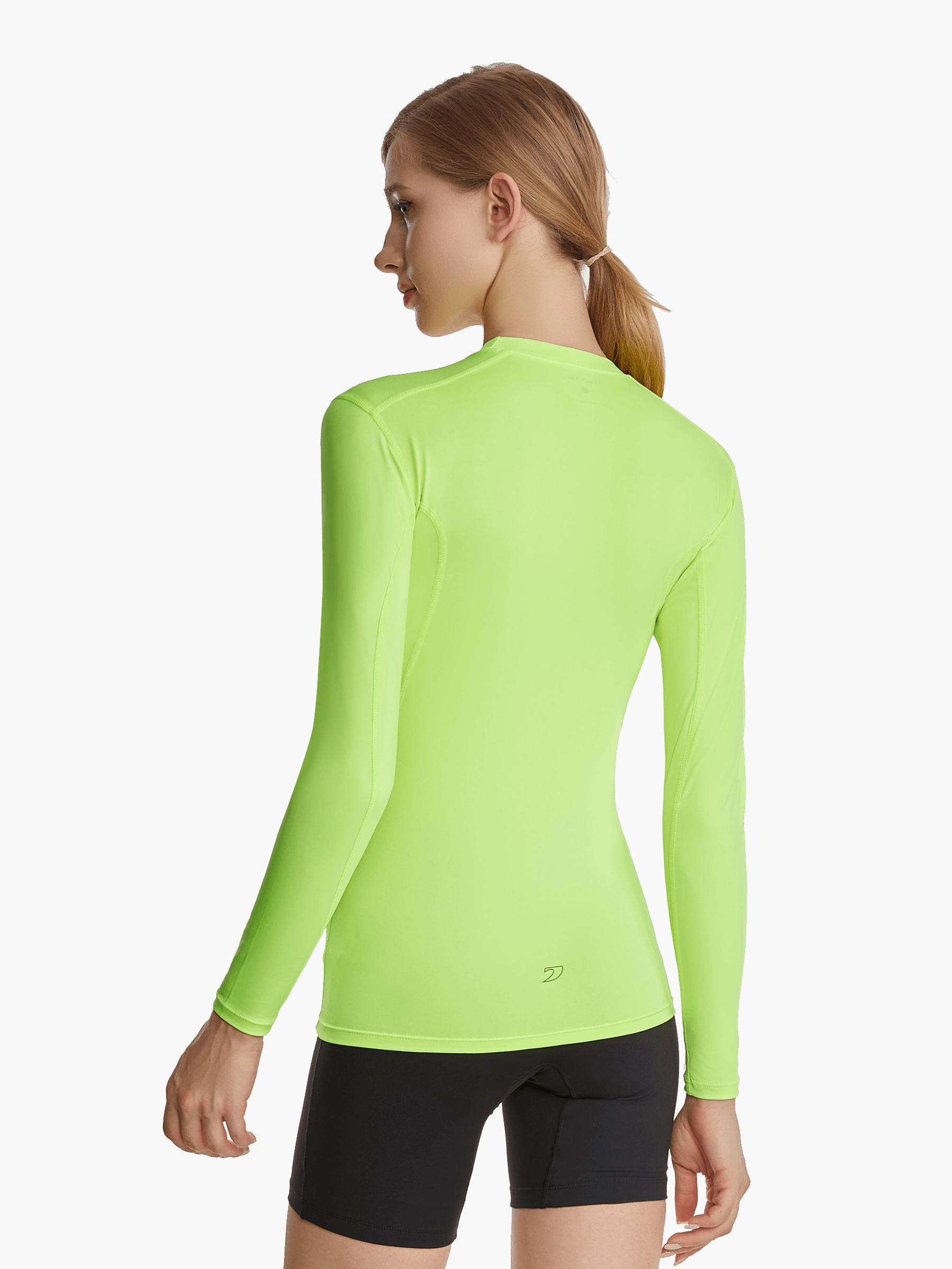 Back view of the SolarShield UVTee Long Sleeve for Ladies in neon yellow, emphasizing its seamless construction, advanced sun protection, and performance-oriented fit for water sports.