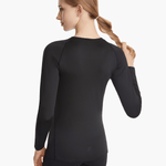 Angled back view of the SolarShield UVTee Long Sleeve for Ladies in black, emphasizing seamless construction and advanced UV-blocking technology for performance on and off the water.