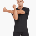 Front view of the Men’s UVTee Lightweight Baselayer in black, with the model stretching, highlighting the moisture-wicking fabric, flatlock stitching, and athletic fit designed for rowers.