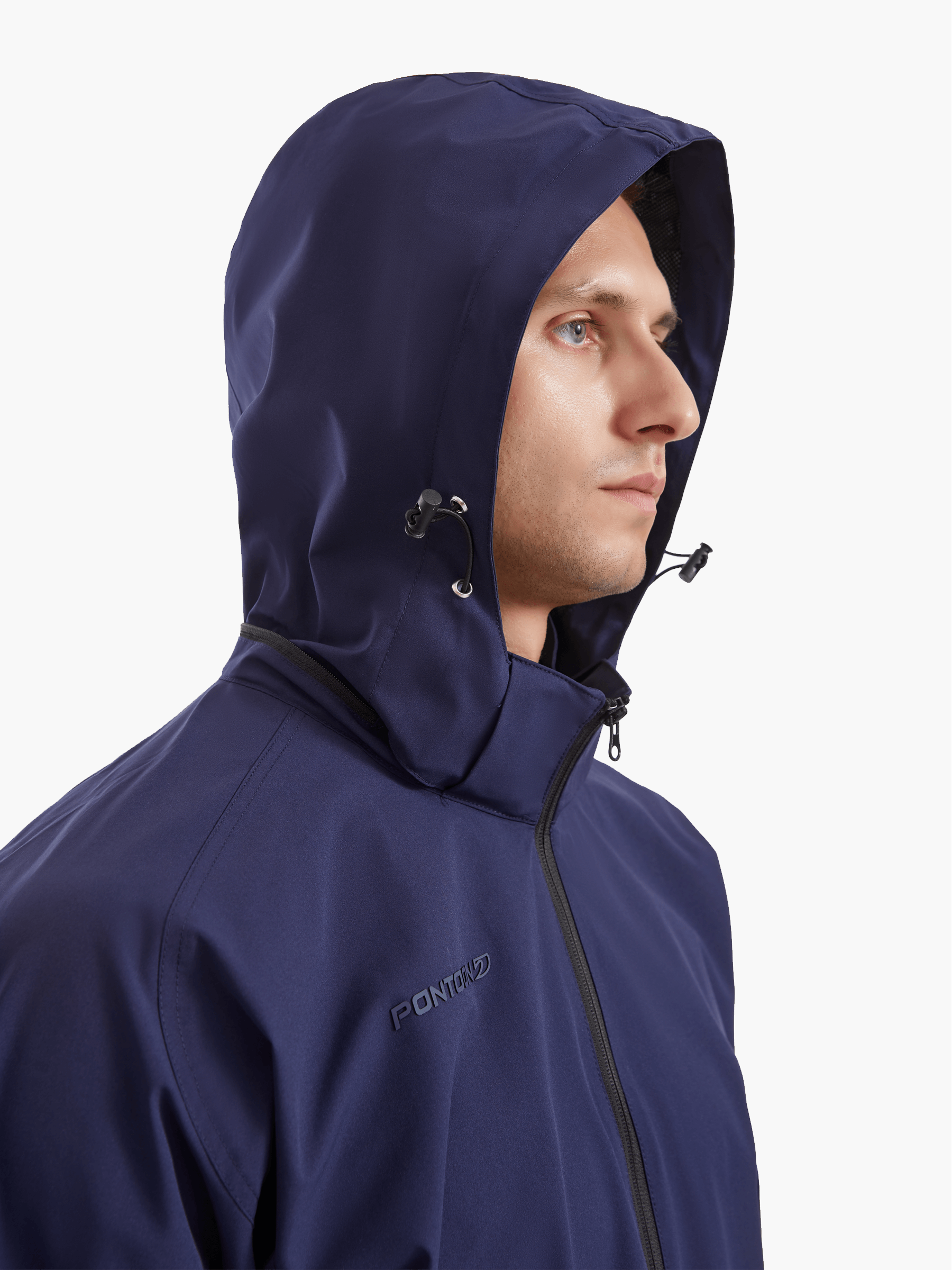 Close-up of the SprayShield Pro Rowing Jacket’s hood in navy, showcasing the fold-away design and toggle adjustments for added protection against the elements