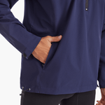 Side view of the SprayShield Pro Rowing Jacket in navy, highlighting the practical side pockets for secure storage of essentials during rowing sessions.