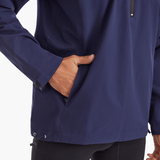Side view of the SprayShield Pro Rowing Jacket in navy, highlighting the practical side pockets for secure storage of essentials during rowing sessions.