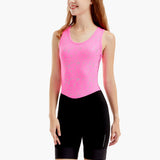 HighViz Women’s Reflective Rowing Unisuit with a bright pink top featuring silver high-visibility reflective material and sleek black bottom, designed for safety and performance.