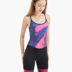Side view of the Velocity Women’s Rowing Suit, emphasizing its seamless construction, ergonomic fit, and abstract design in shades of pink and blue for rowers.