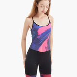 Side view of the Velocity Women’s Rowing Suit, emphasizing its seamless construction, ergonomic fit, and abstract design in shades of pink and blue for rowers.