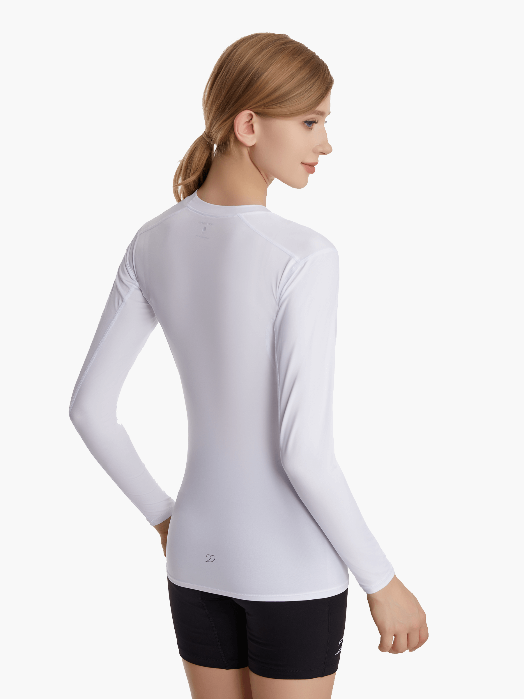 Angled back view of the SolarShield UVTee Long Sleeve for Ladies in white, emphasizing seamless construction and advanced UV-blocking fabric for performance on the water.