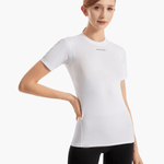 Angled front view of the SolarShield UVTee for Ladies in white, showcasing its moisture-wicking properties, seamless construction, and stylish fit designed for female rowers.