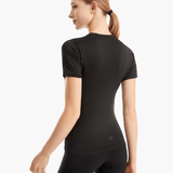 Back view of the SolarShield UVTee for Ladies in black, emphasizing seamless construction, breathable material, and water-resistant performance for rowing and outdoor activities.
