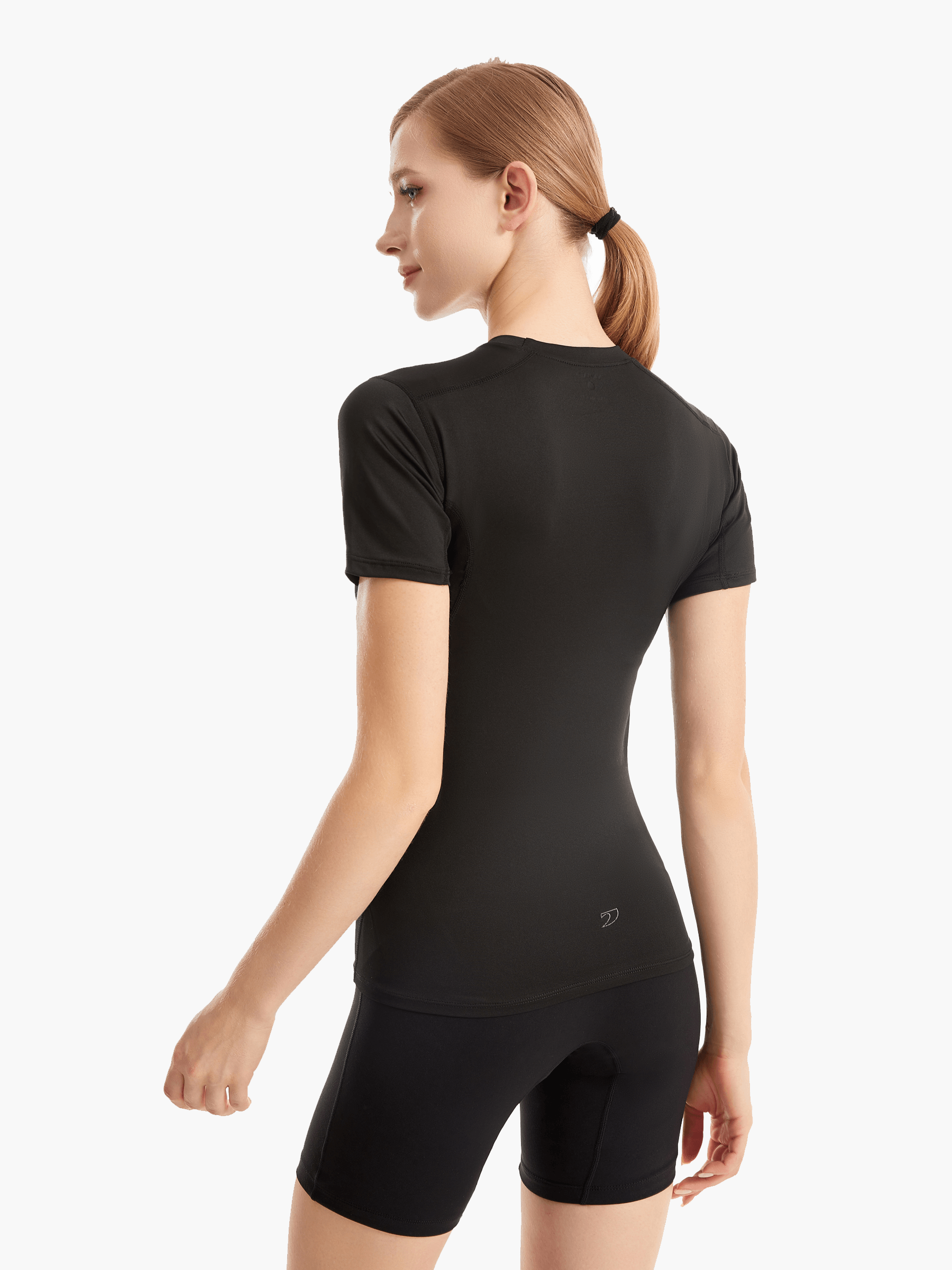 Back view of the SolarShield UVTee for Ladies in black, emphasizing seamless construction, breathable material, and water-resistant performance for rowing and outdoor activities.