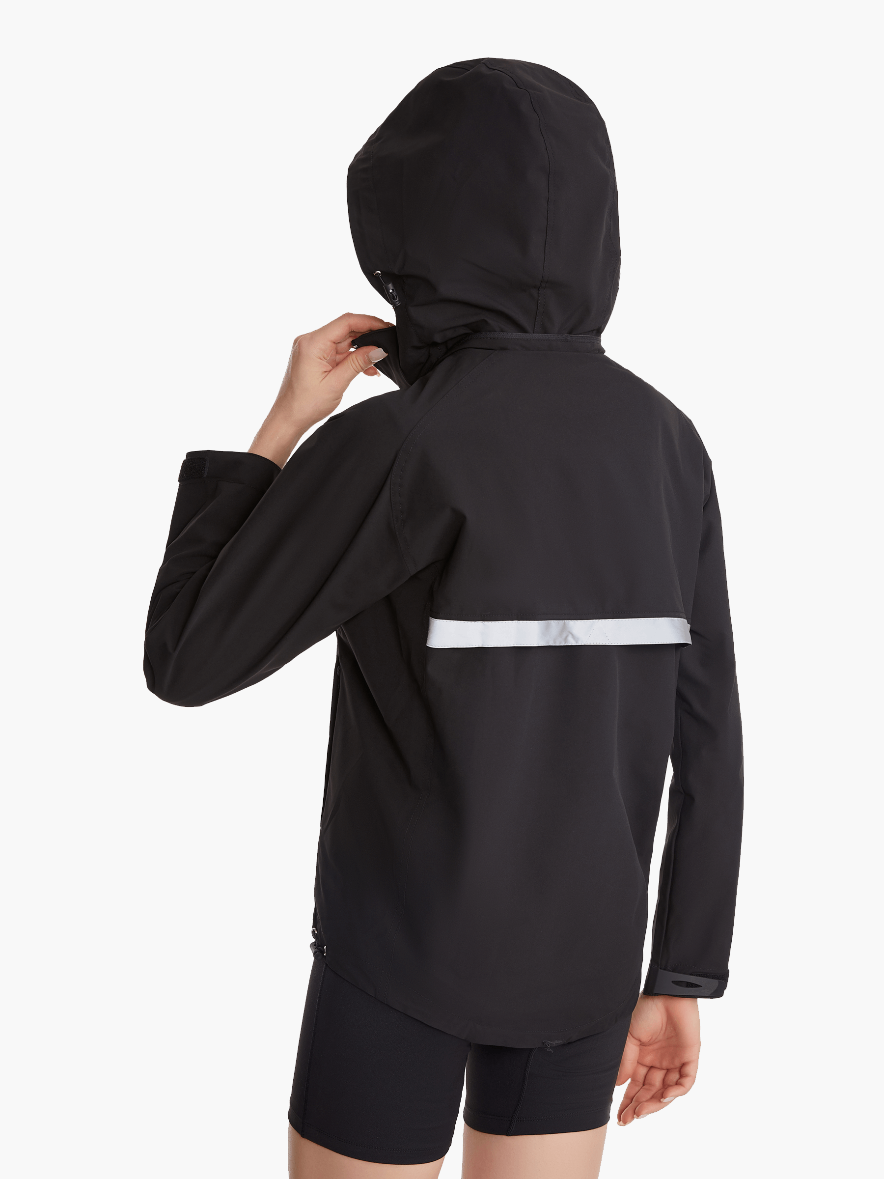 Angled back view of the SprayShield Pro Rowing Jacket in black, showing the fold-away hood, reflective detailing, and adjustable fit for protection during rowing in all conditions.