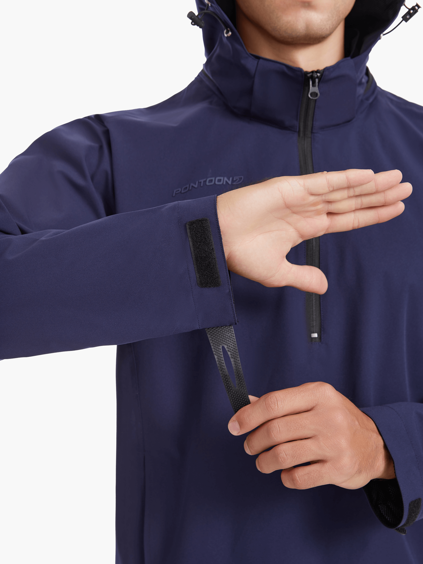 Close-up of the SprayShield Pro Rowing Jacket’s sleeve in navy, showing the adjustable cuff for wind and rain protection while rowing