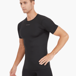 Side view of the Men’s UVTee Lightweight Baselayer in black, showcasing its form-fitting design, breathable fabric, and ergonomic fit for unrestricted movement during rowing.