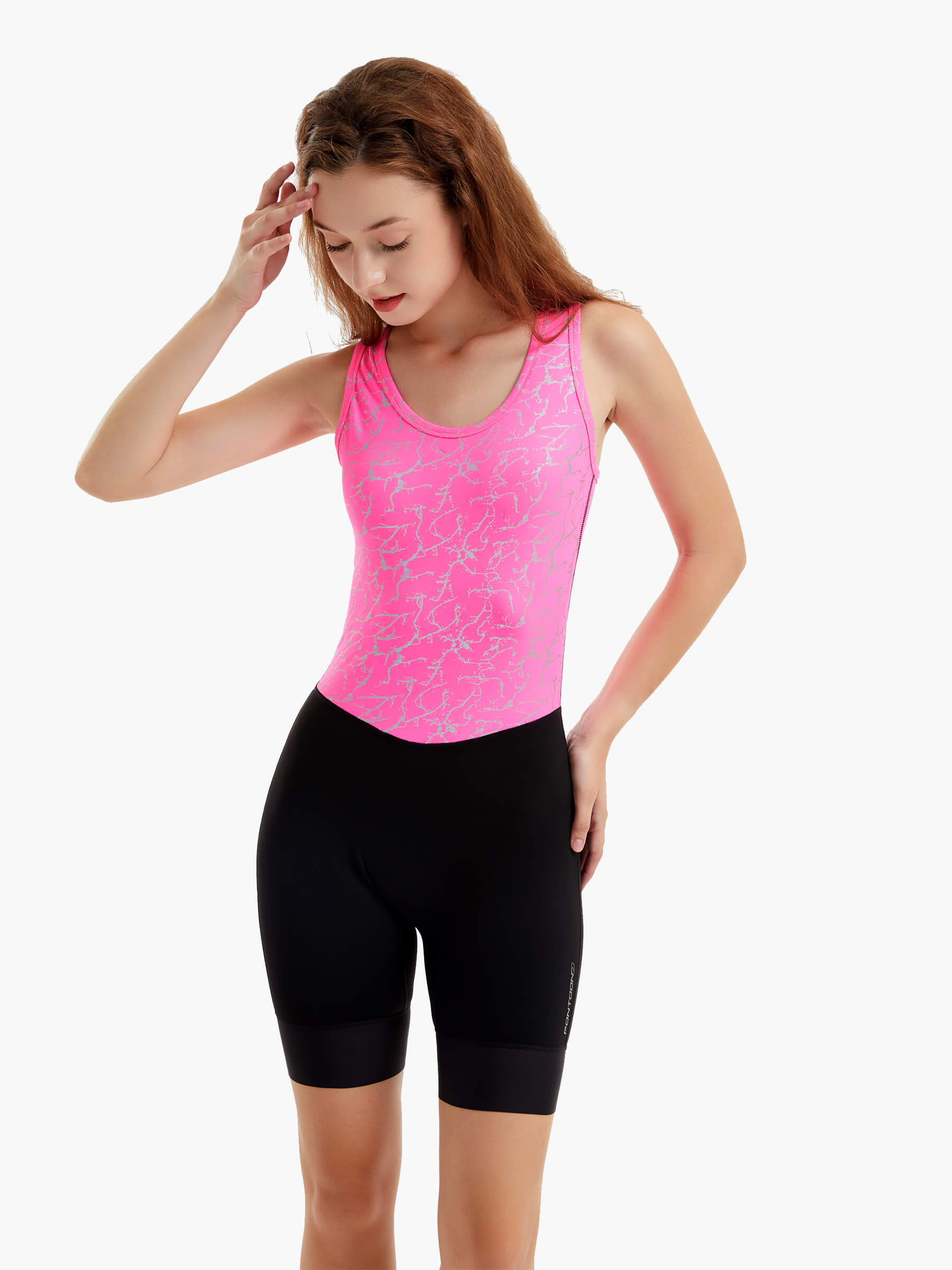 HighViz Women’s Reflective Rowing Suit showing the bold pink reflective top, black bottom, and silicone-infused cuffs for a secure fit