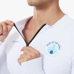 Paul wearing a white Long Sleeve UV Tee Baselayer with head of the yarra 2025 logo on the chest