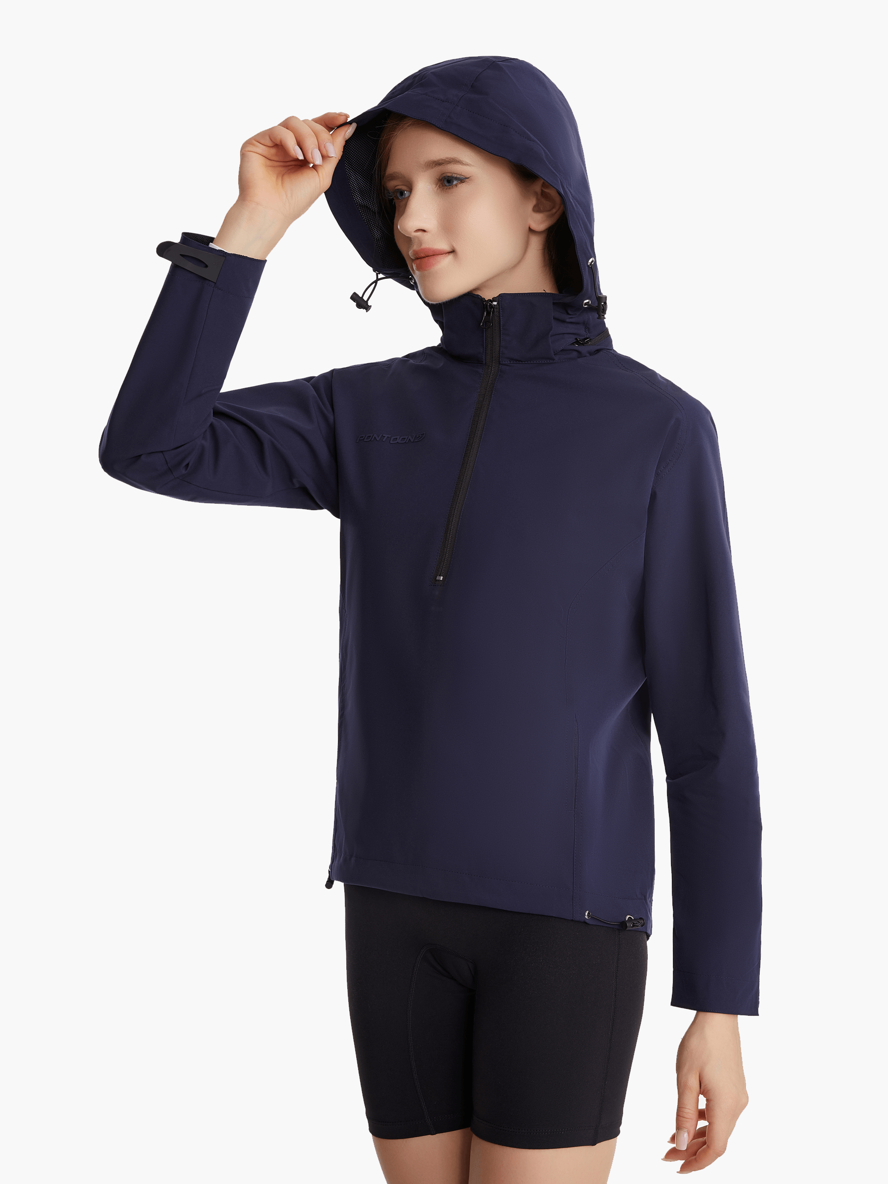 Angled side view of the SprayShield Pro Rowing Jacket in navy with the hood up, emphasizing its fold-away design and weather-ready construction for rowing in challenging conditions.